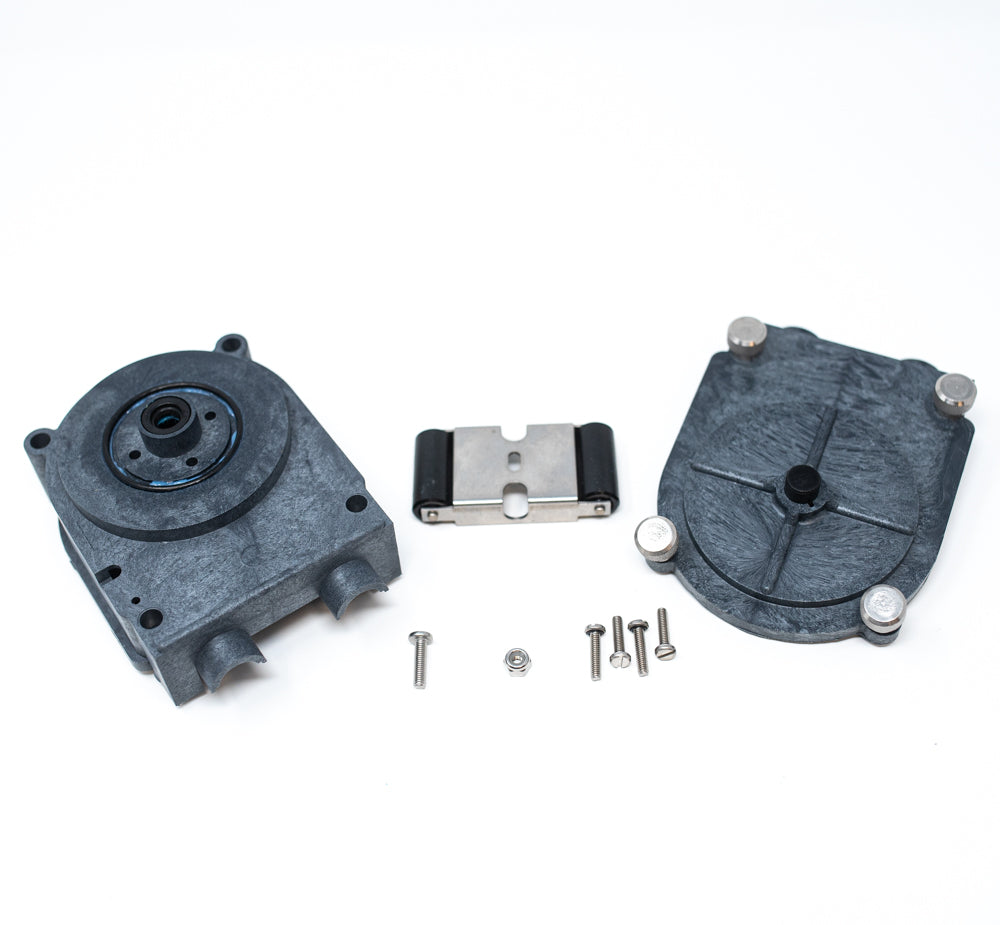 A close-up of a black plastic housing featuring metallic screws, highlighting the texture and design of the materials.