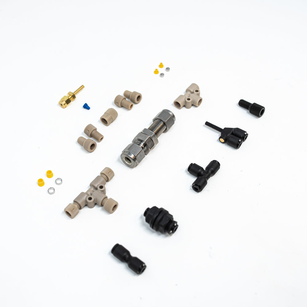 A collection of various hose parts displayed together, showcasing different shapes and sizes for versatile applications.