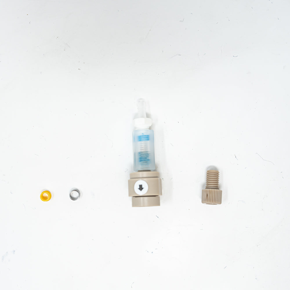 A collection of tubing nuts and ferrules positioned against a clean white background, showcasing its vibrant colors and design.