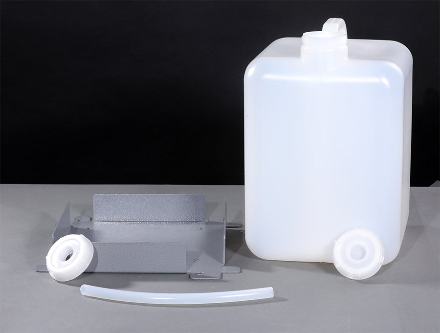 An adapter and a white plastic container arranged together on a neutral background.
