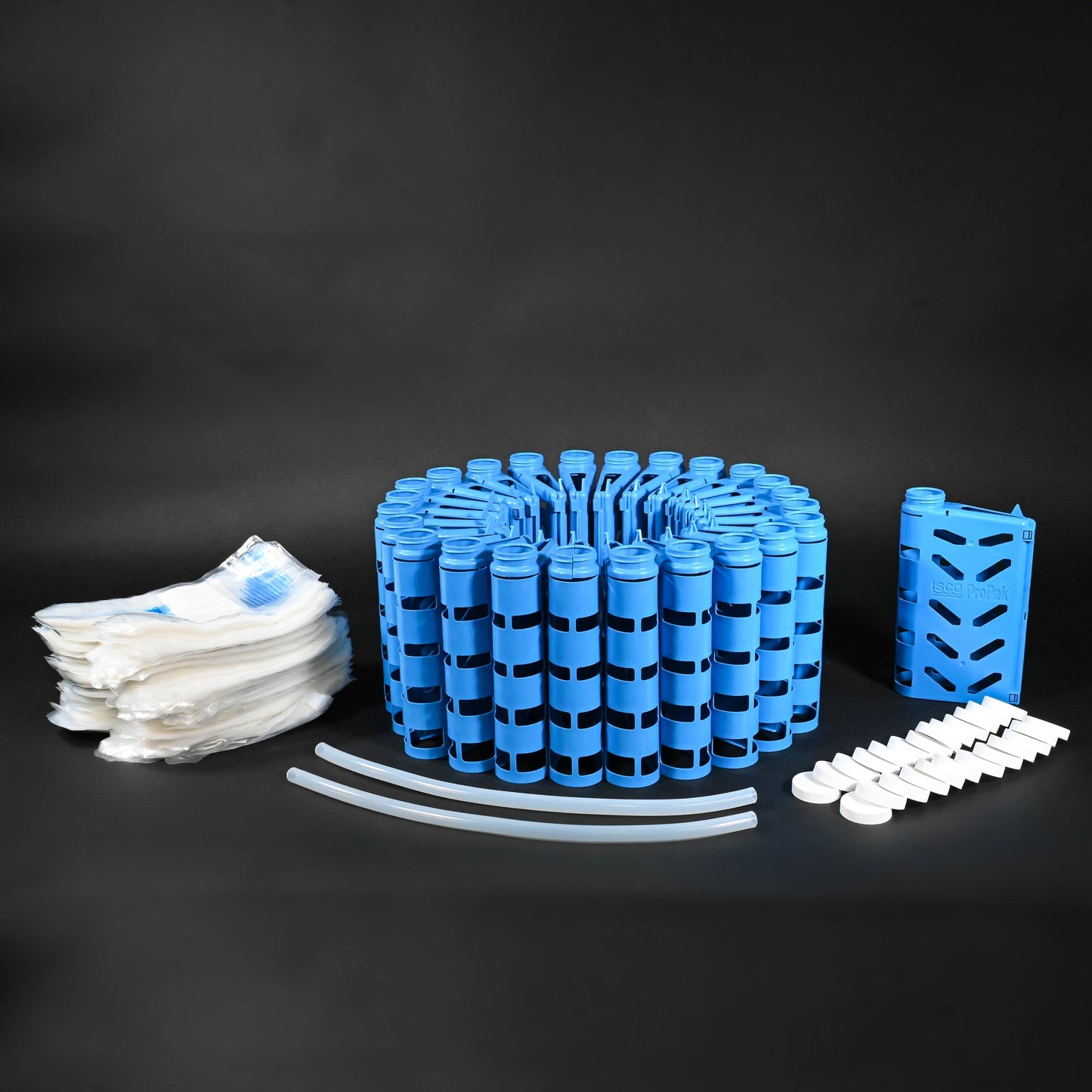 A blue plastic holders equipped with a white caps and bags, showcasing a practical and user-friendly design.