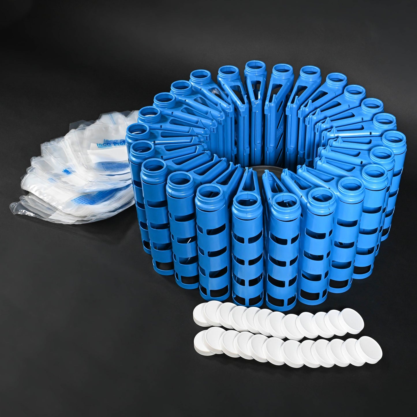 A blue plastic holders equipped with a white caps and bags, showcasing a practical and user-friendly design.