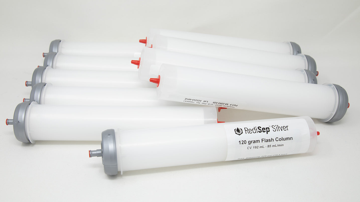 A group of plastic tubes with red and silver caps, positioned side by side, emphasizing their contrasting colors and forms.
