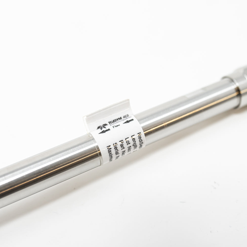 A stainless steel tube positioned against a clean white background, showcasing its sleek and reflective surface.