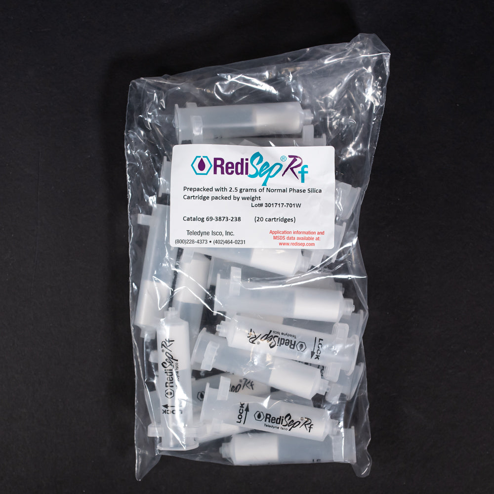 A set of white plastic cylindrical shaped objects placed on a sleek black surface, creating a striking contrast between the two colors.