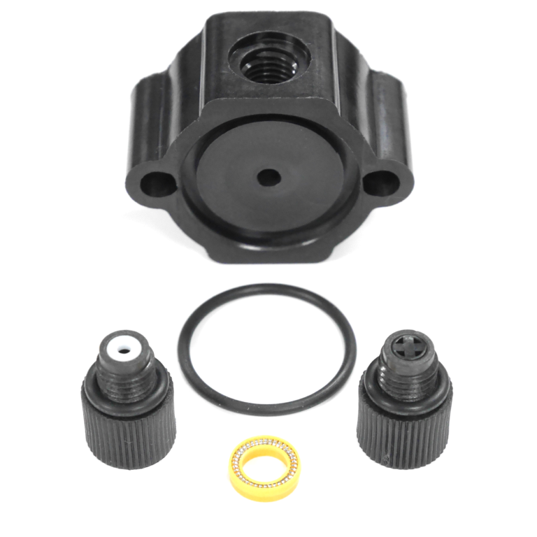 Various items used in the self-flush assembly pictured on a white background.