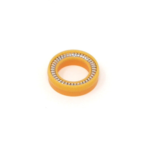 A yellow rubber seal featuring a stainless steel spring installed.