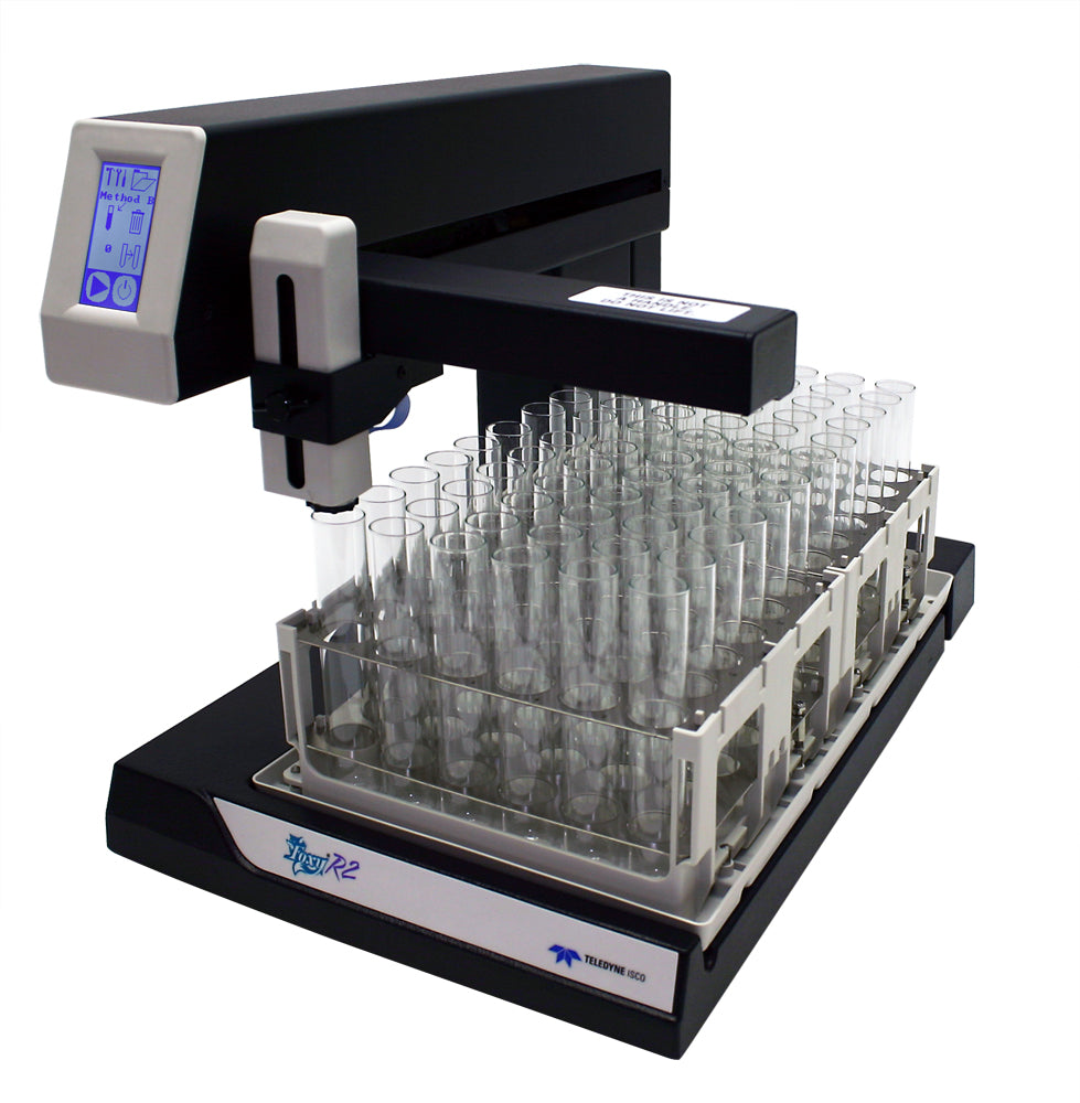 A laboratory machine featuring a digital display and multiple test tubes arranged for scientific analysis.