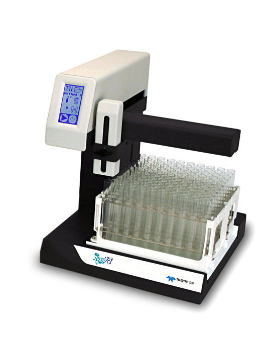 A lab machine equipped with a digital display, showcasing a set of glass vials as part of its setup.