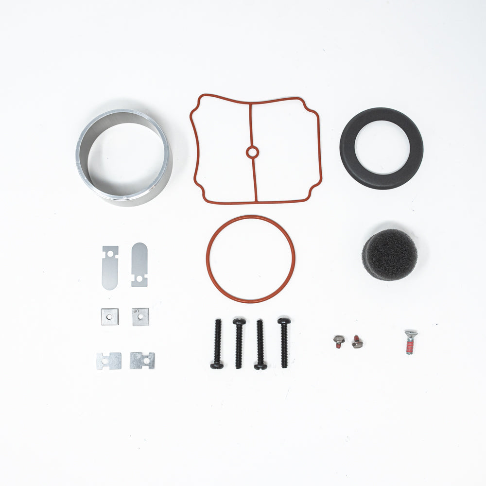 A service kit for a compressor, featuring various gaskets and seals for optimal compressor performance and maintenance.