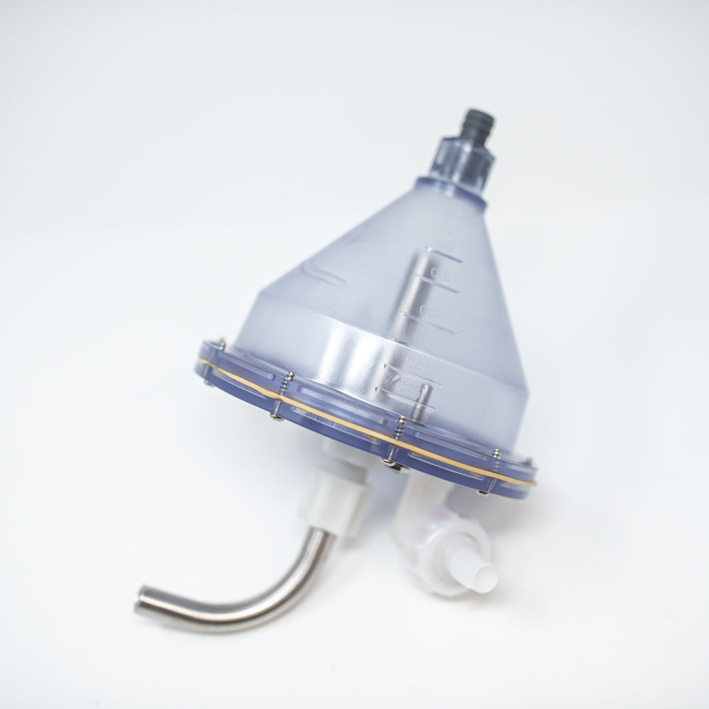 A funnel shaped container featuring a central hole, showcasing its simple yet functional design.