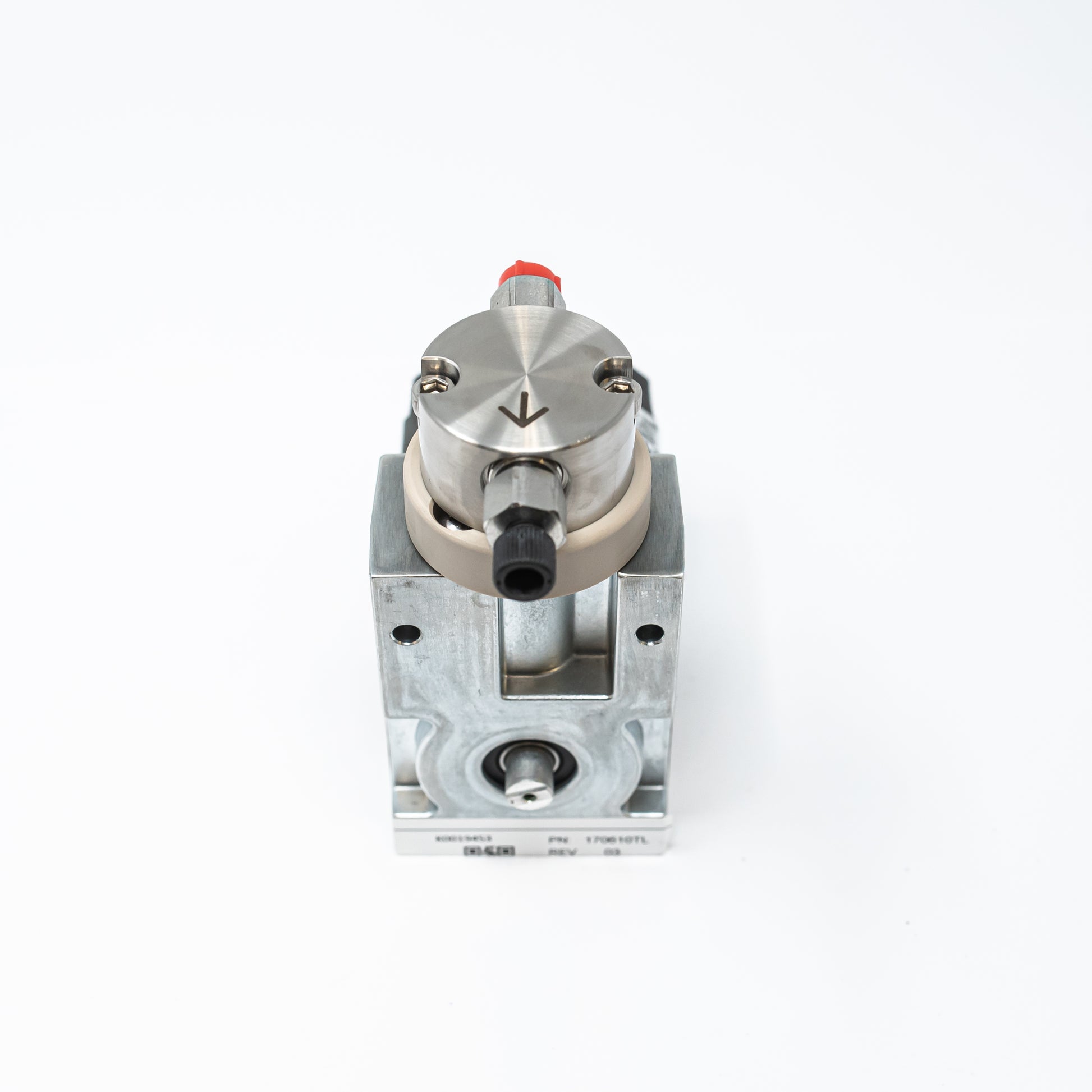 A small gear pump displayed on a white background, showcasing its compact design and mechanical features.