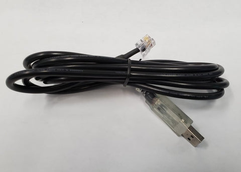 A black cable with a clear connector