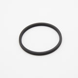 Circular black object with installed spring