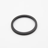 Circular black object with installed spring