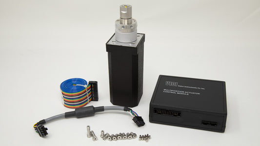 Two black boxes accompanied by multiple electronic components displayed alongside.