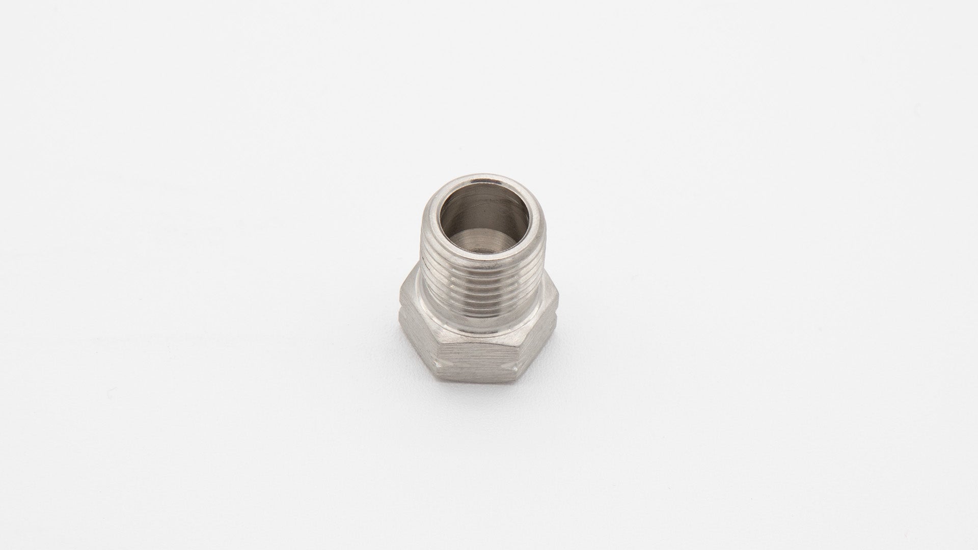 A close-up of a metal nut
