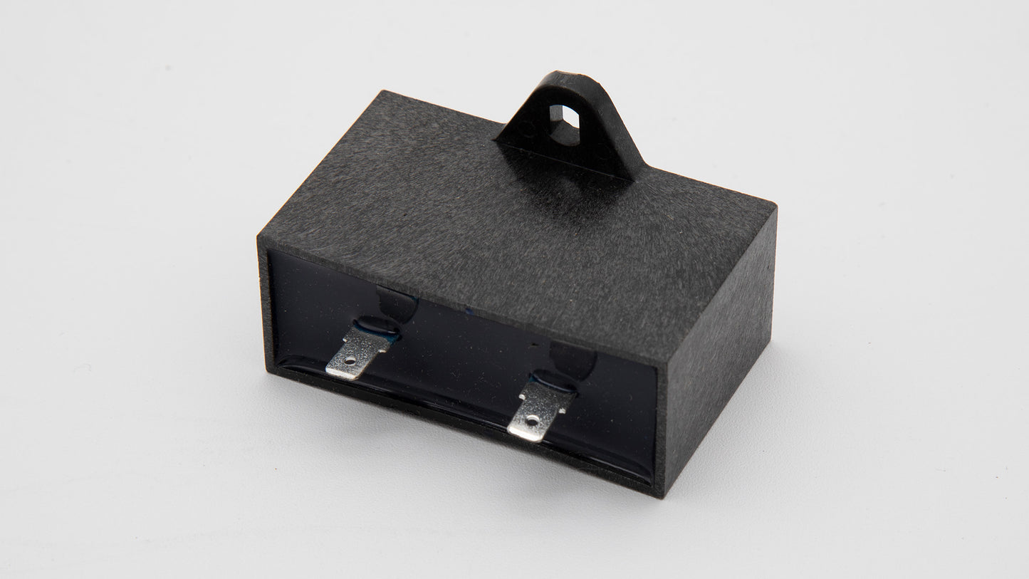 A black rectangular object with two metal parts