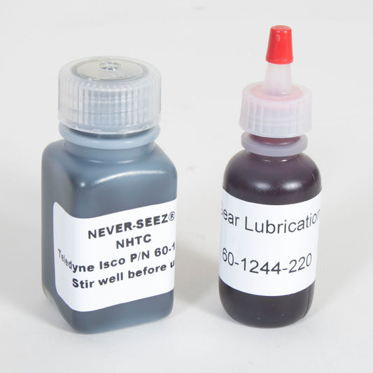 Two lubricant bottles placed adjacent to each other, highlighting their distinct shapes and branding.