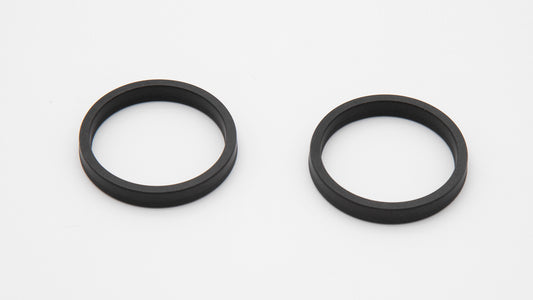 A pair of black circular objects