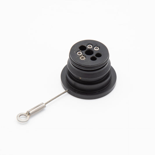 A black round object with a wire