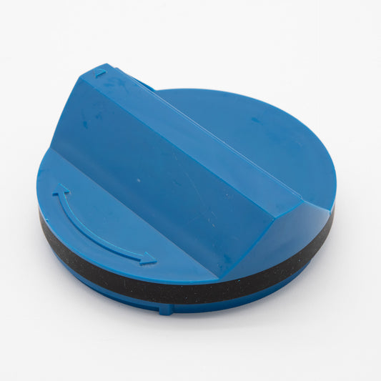 Blue plastic circular object with handle and black ring.