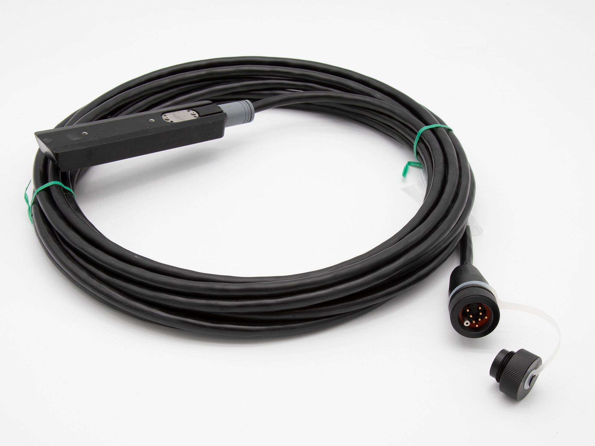 A black cable with sensor terminating in a connector, ideal for connecting devices in a variety of electronic setups.