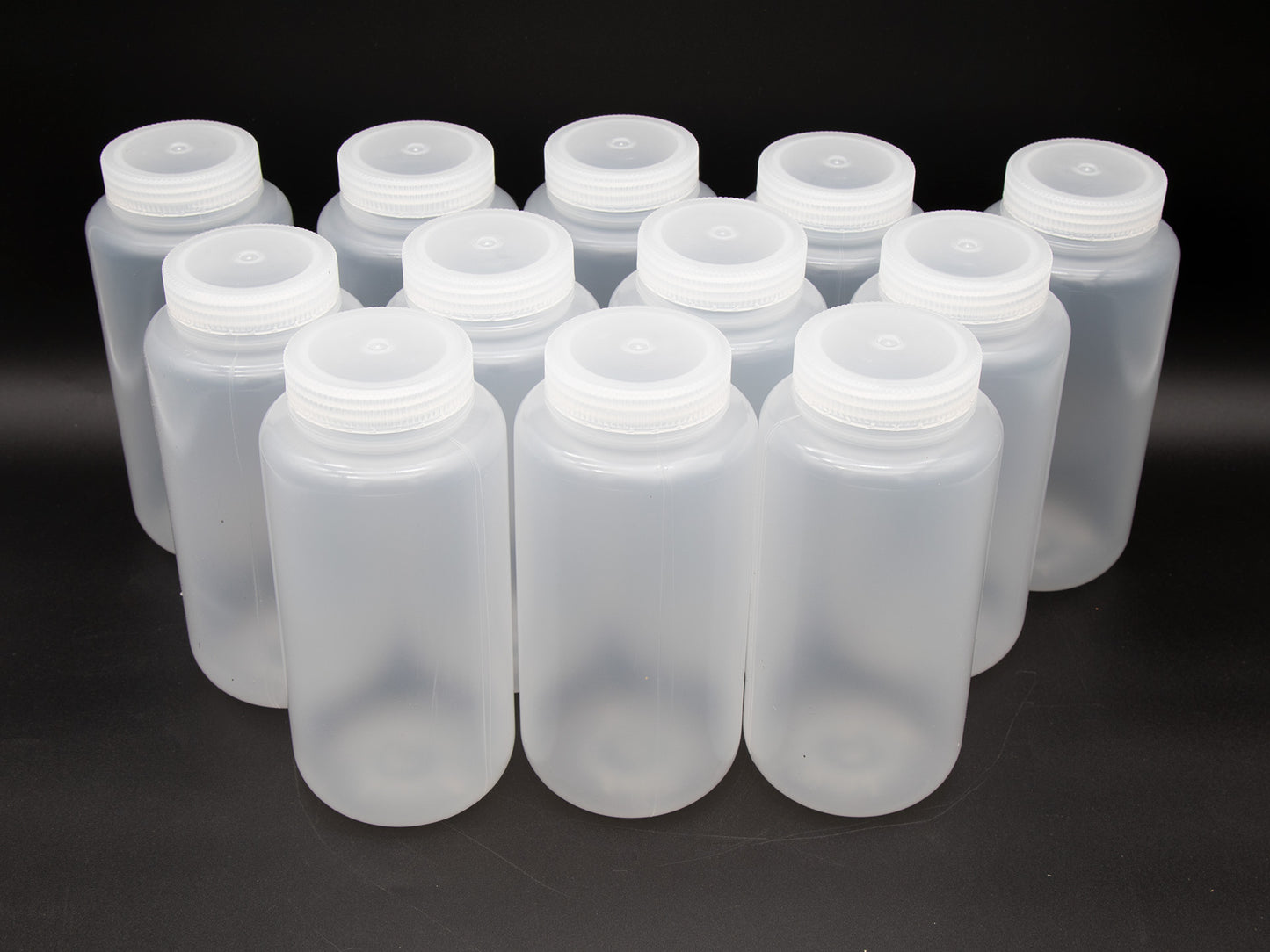 Set of plastic bottles with caps