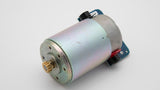 A small round motor with a blue circuit board