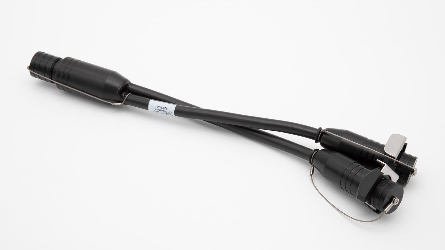 A black cable with plug terminating with two connectors, showcasing a simple yet functional design for connectivity.