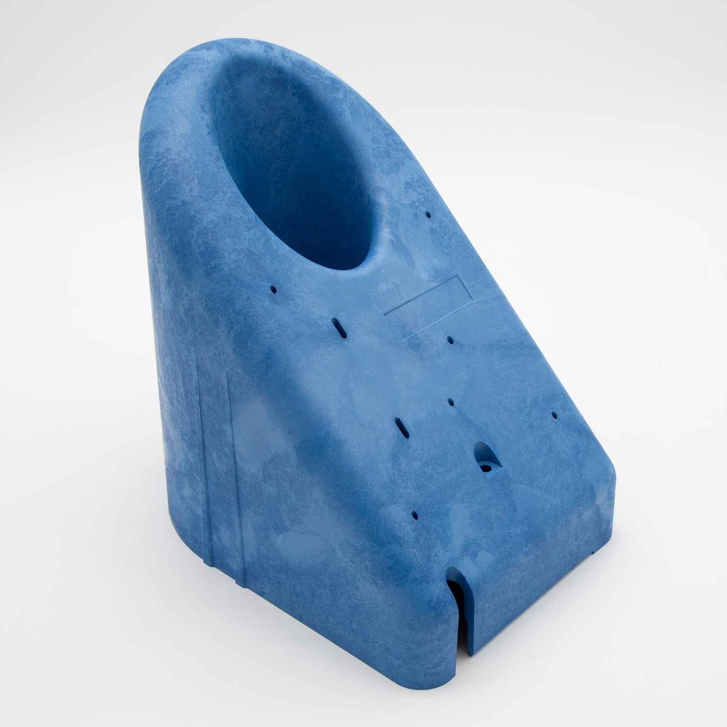 A blue plastic object featuring a central hole, showcasing its unique design and material.