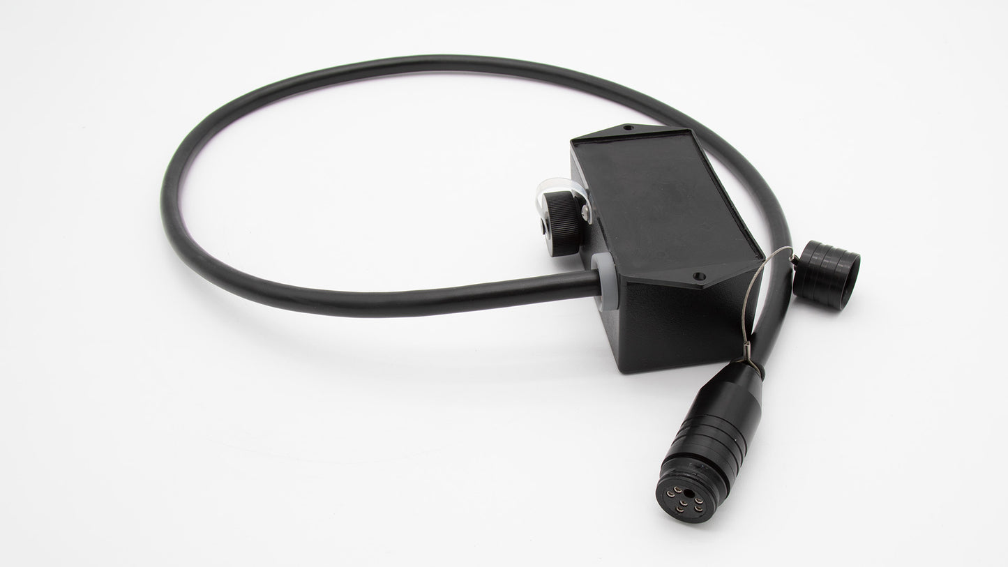 A black device with a cable and connector