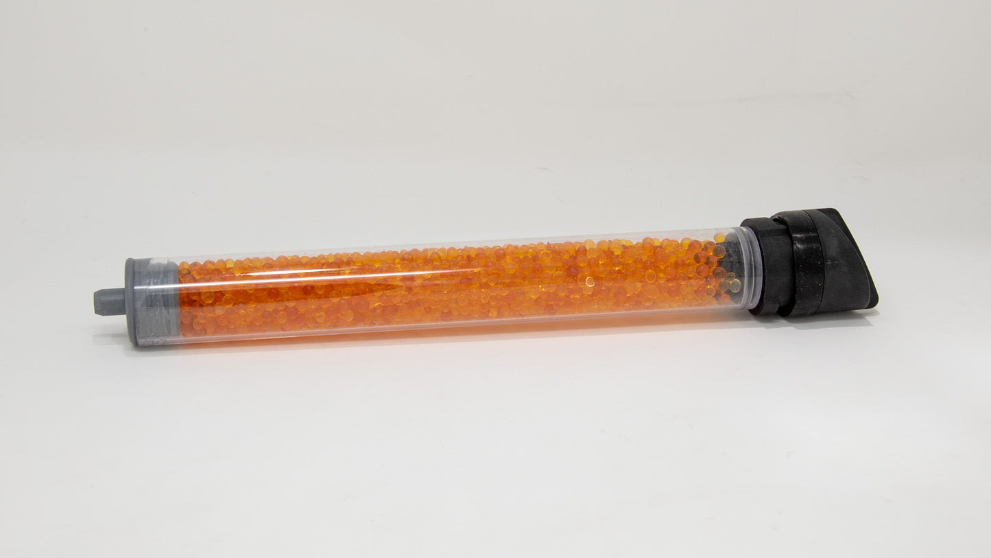 Clear plastic tube with caps, filled with desiccant beads.