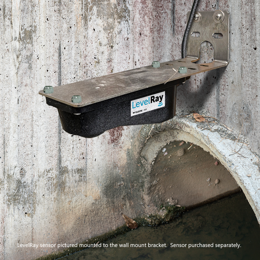 LevelRay sensor mounted to a wall mount bracket against a concrete wall.