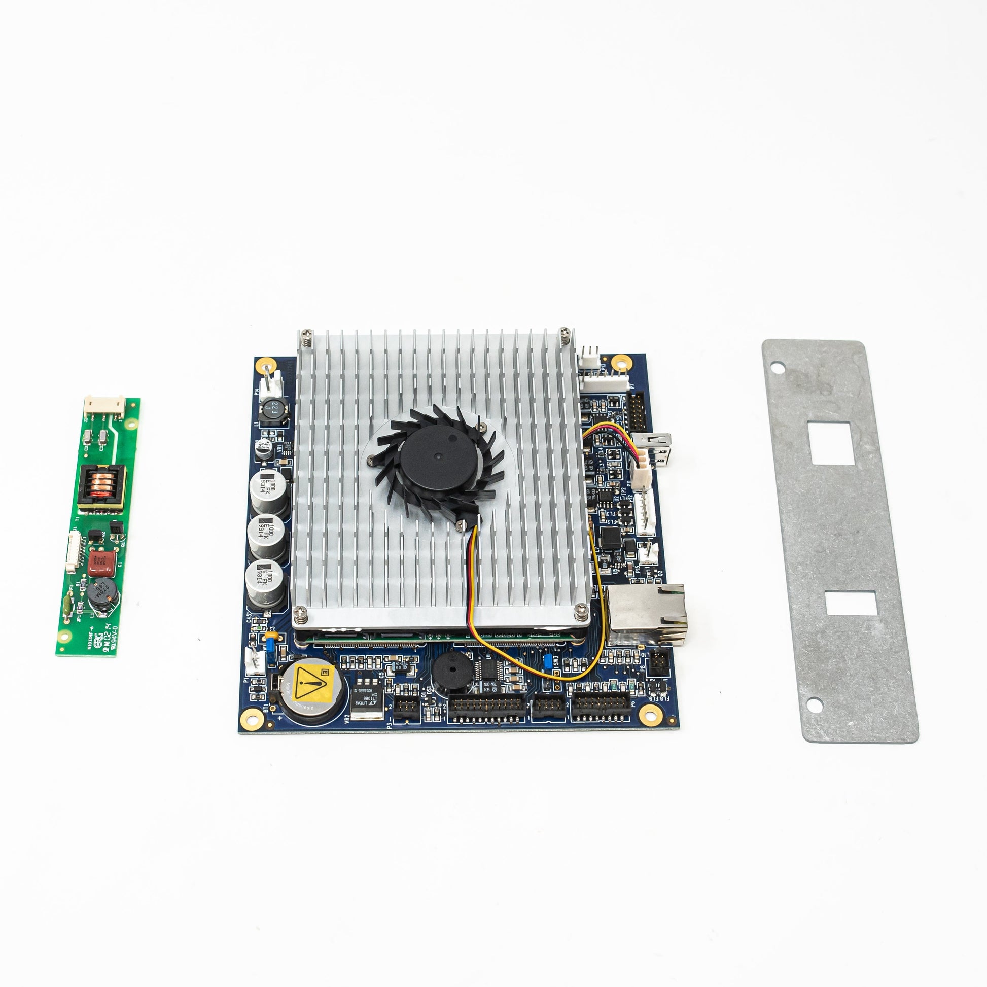 A small circuit board featuring a cooling fan, showcasing its compact design and essential electronic components.