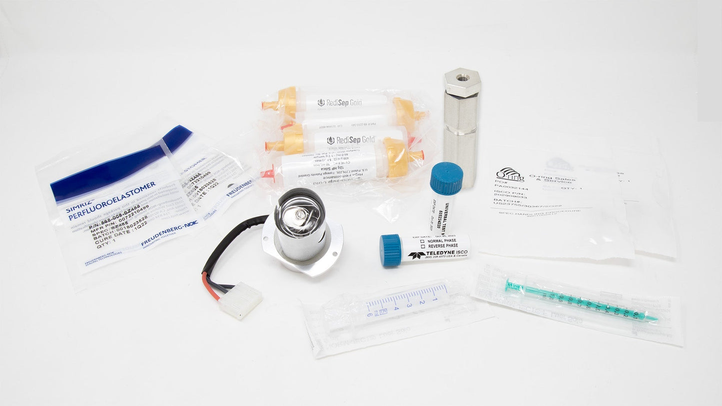 A comprehensive kit containing a tube, syringe, and additional supplies, designed for laboratory use.