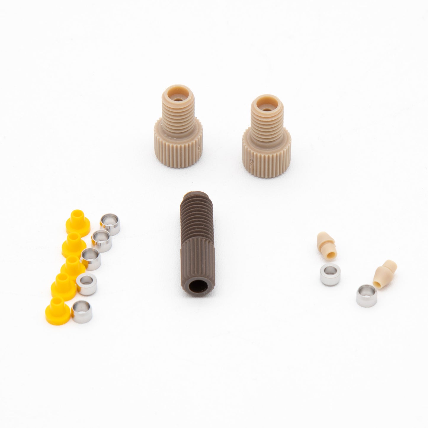 A collection of plastic components featuring screws, nuts, and washers arranged together on a neutral background.