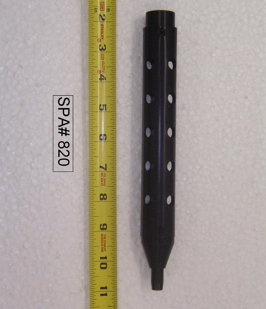 Black cylindrical object with holes and measurement tape for reference.