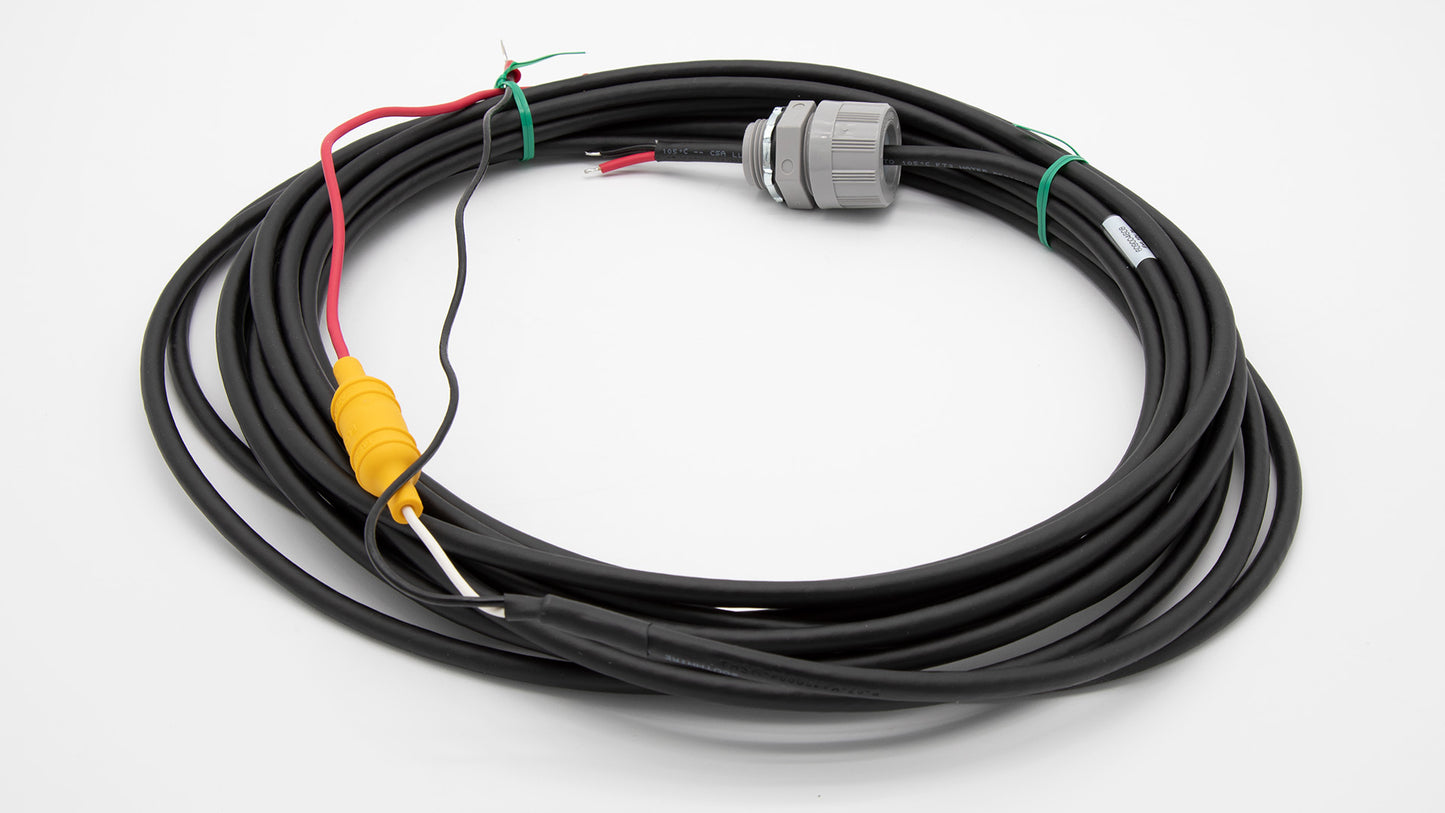 A roll of black cable with red and green wires.