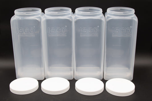 Set of four square shaped plastic bottles with caps