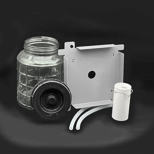 A glass jar and lid with platform and tubes .