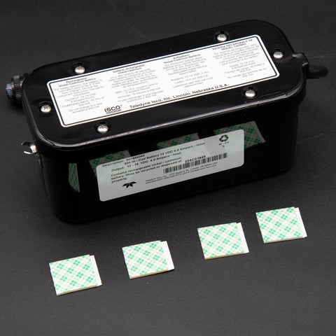 A battery and square stickers