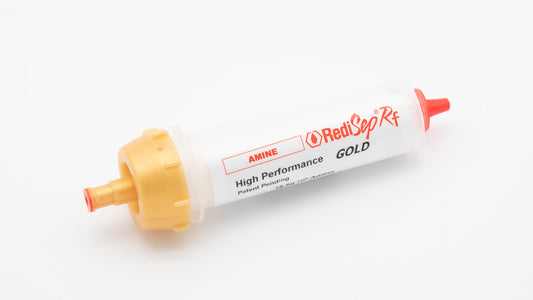 A white tube with a gold cap and red tip, showcasing a simple yet functional design for practical applications.