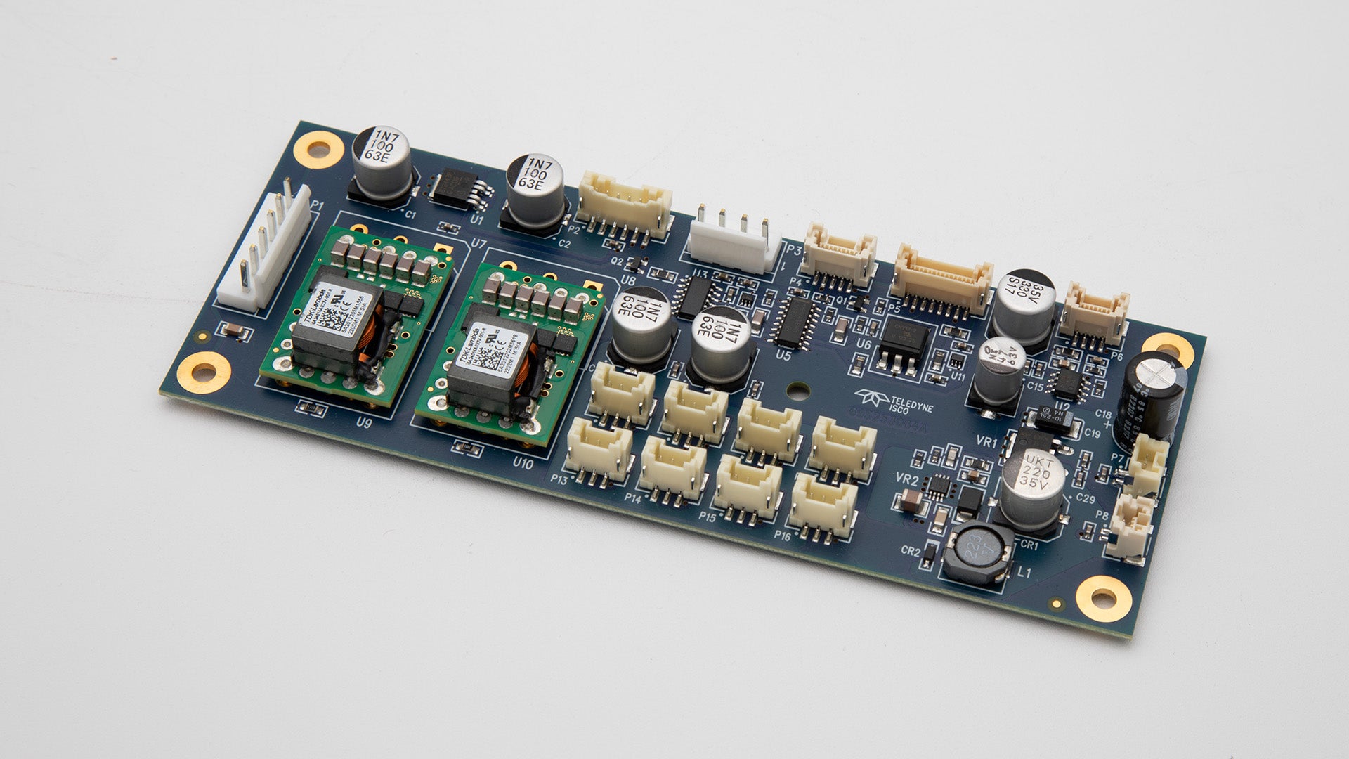 A small electronic circuit board featuring various electronic components arranged neatly on its surface.