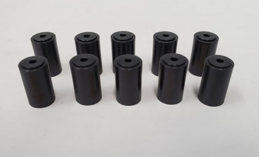 A group of black cylindrical objects