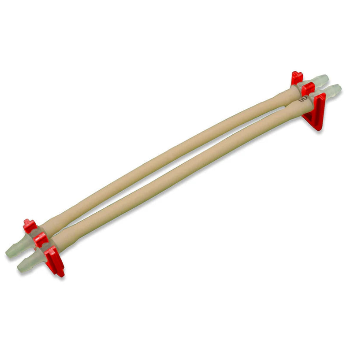 Two red and white plastic tubes featuring red handles, positioned side by side against a neutral background.