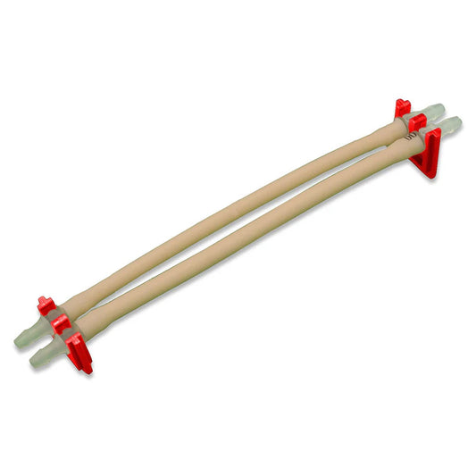 A pair of beige colored tubes in red holders