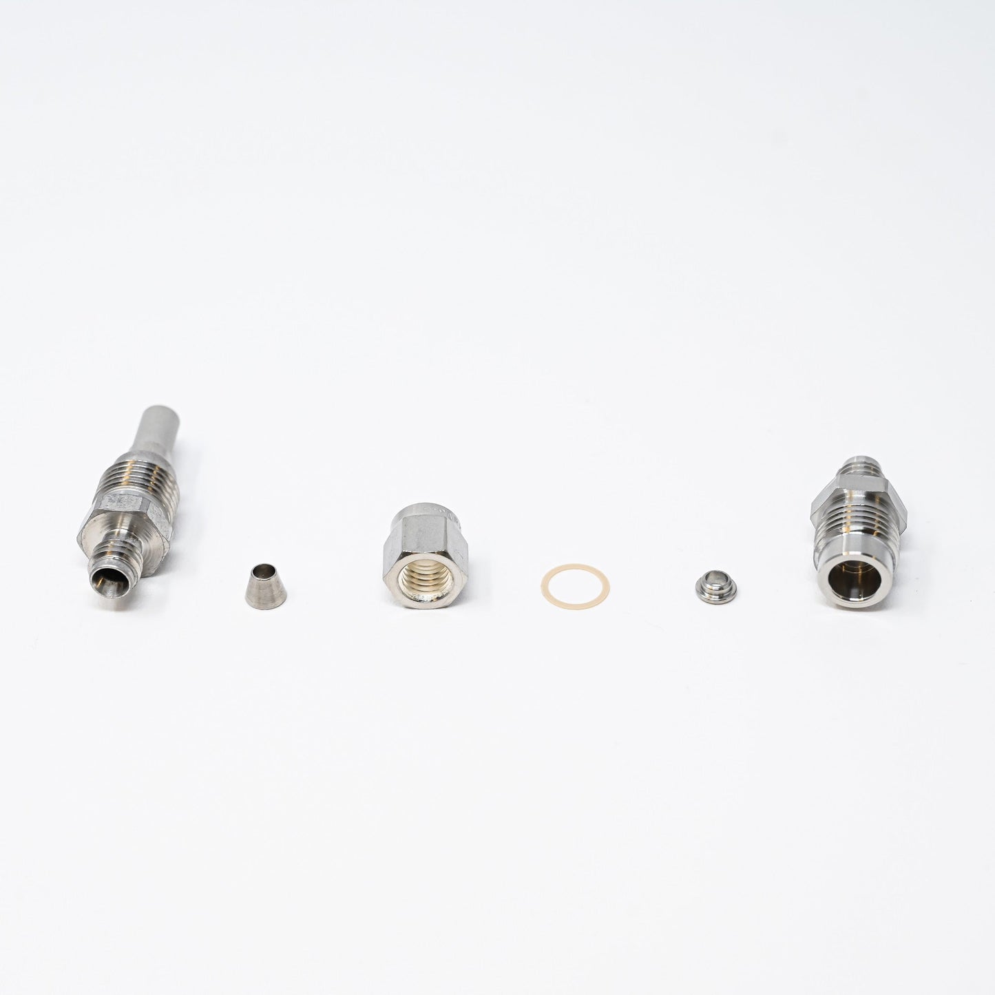 Collection of parts for fittings adapter kit.