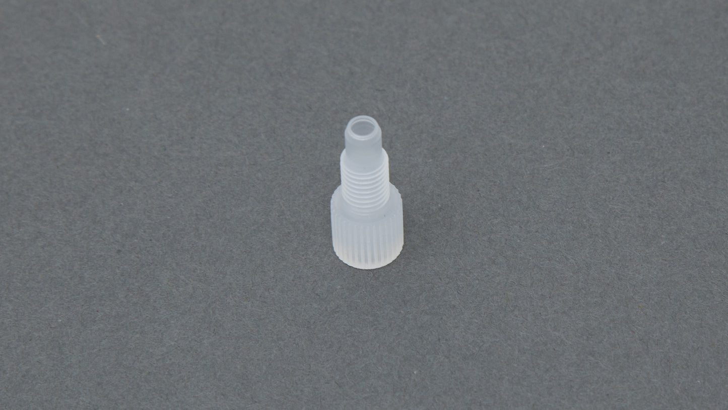 Clear plastic nut with threads.