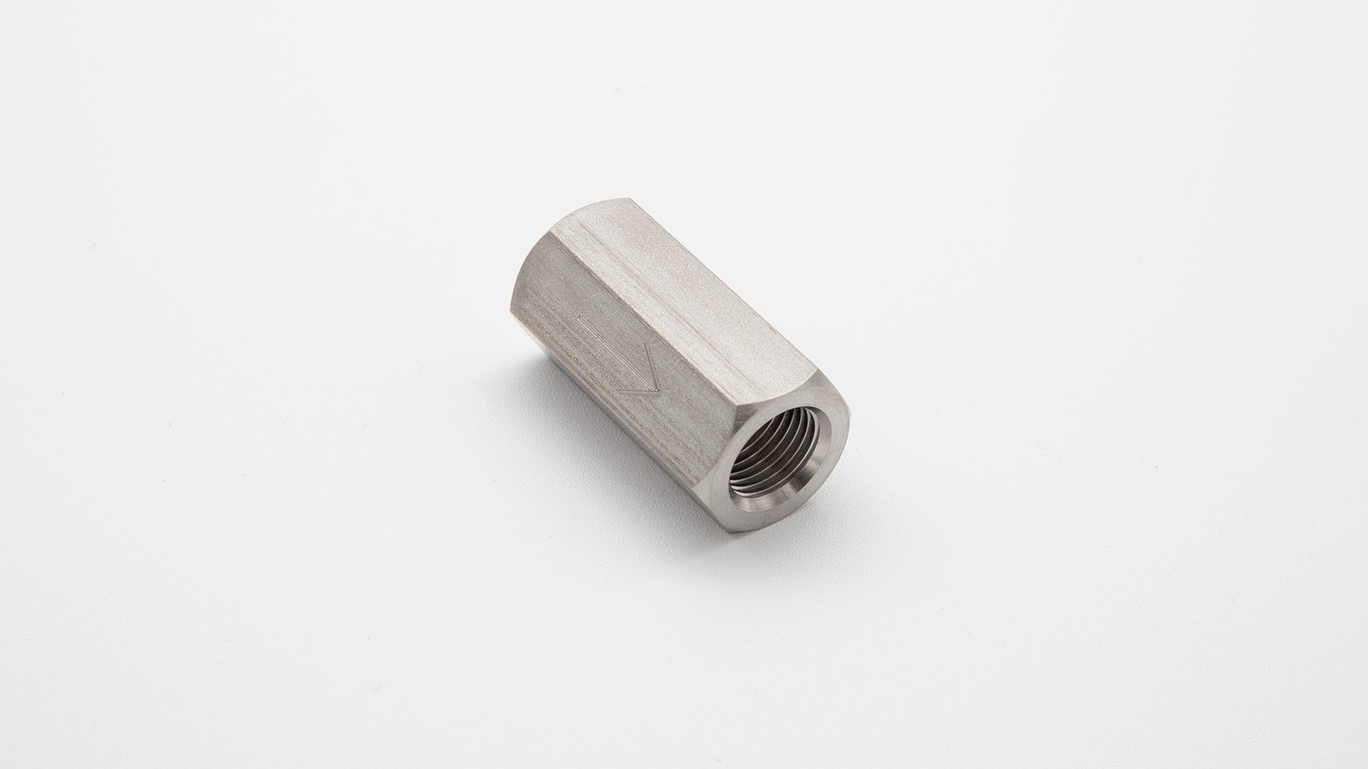 Cylinder with threaded hole in center.